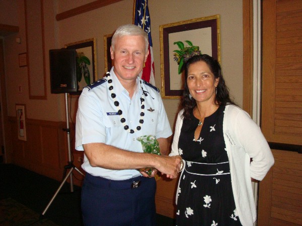 Maj. Gen. Norman J. Brozenick Jr., USAF, commander, Special Operations Command Pacific, U.S. Pacific Command, receives a thank you from Cynthia Pacheco, chapter president, at the October luncheon.
